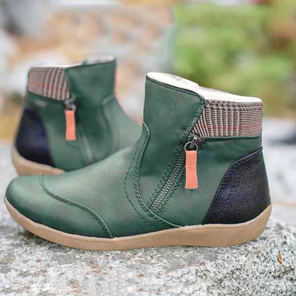 Groene leren enkellaarsjes met ritssluiting, bruine zool en geruite details. Comfortabele dameslaarzen, ideaal voor herfstmode en casual outfits.