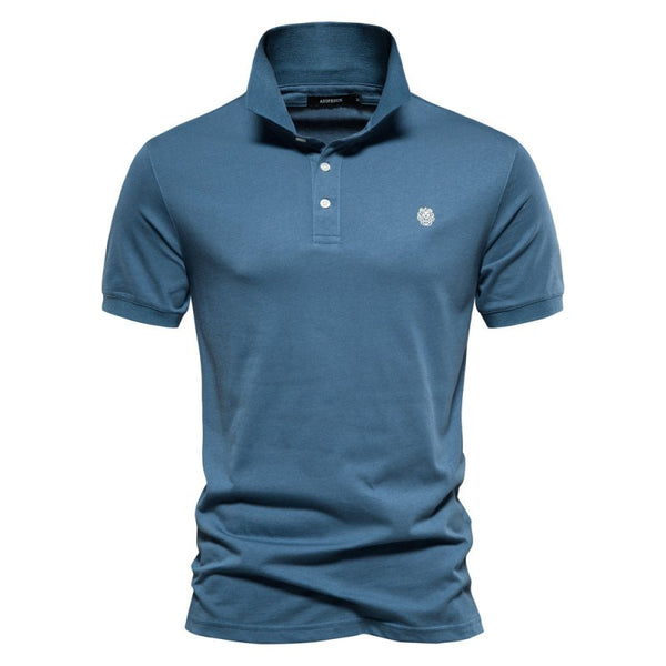 Blauwe herenpolo met korte mouwen, knoopsluiting en geborduurd logo. Stijlvolle casual kleding, perfect voor dagelijks gebruik.