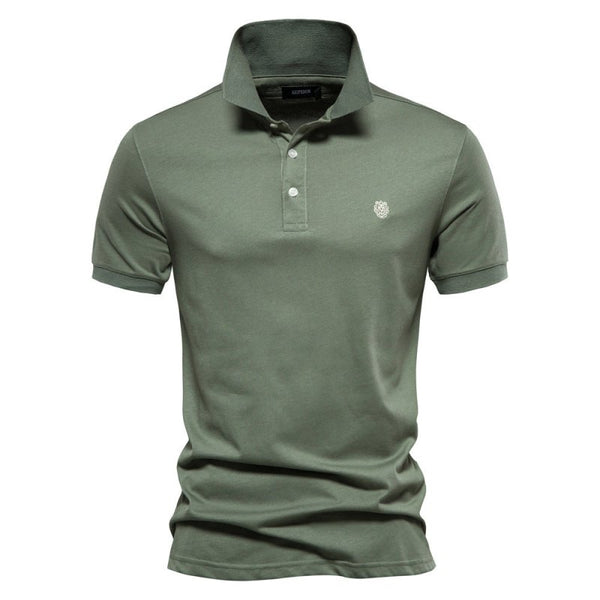 Groene polo met korte mouwen, klassieke kraag en knoopsluiting. Ideaal voor casual en zakelijke outfits. Hoogwaardige katoenen stof.