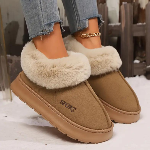 Bruine dames pantoffels met bontvoering, casual wintermode, comfortabele warme schoenen, sportief design, ideaal voor koude dagen.