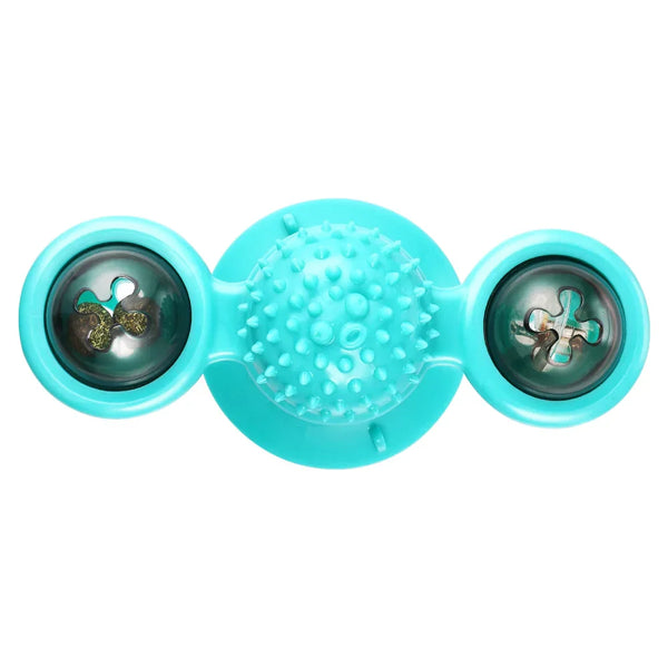 Turquoise kattenspeeltje met zuignap, draaiende ballen en borsteltextuur voor tandverzorging en interactief spel. Geschikt voor katten van alle leeftijden.