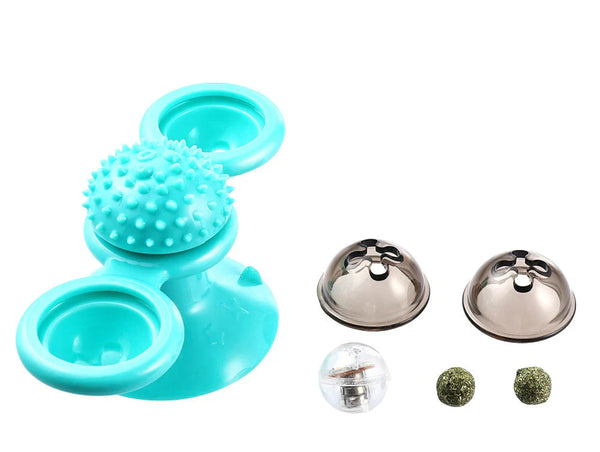 Turquoise kattenspeeltje met zuignap, draaiende schijven en massageborstels, inclusief bel en kattenkruidballen. Interactief speelgoed voor katten.