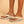 Beige orthopedische slippers voor dames, comfortabel design met open teen en verstelbare band, ideaal voor dagelijks gebruik en zomerse outfits.
