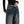 Vrouw in zwarte trui draagt wijde, vintage jeans met rafelige zakken. Modieuze casual outfit, trendy denim stijl.