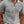 Grijze geribbelde polo voor heren, korte mouwen, casual stijl, perfect voor zomeroutfits. Comfortabele pasvorm, modieuze herenkleding.