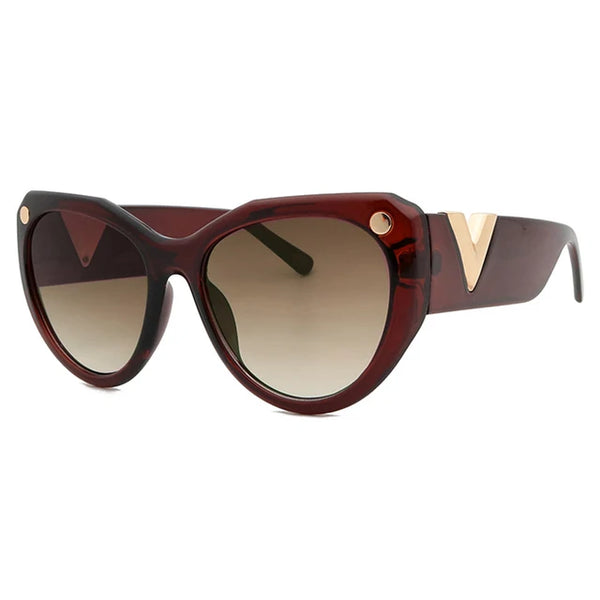 Zwarte oversized zonnebril voor dames, luxe merk, verfijnd ontwerp met grote glazen en gouden details. Modieuze accessoires voor vrouwen.