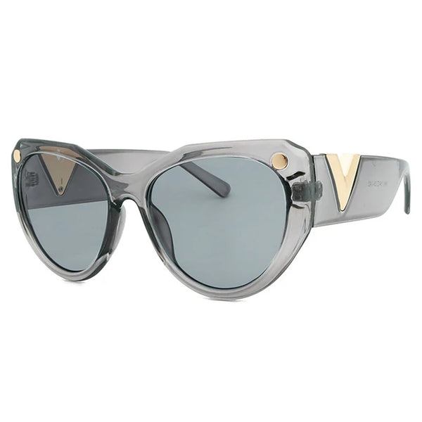 Zwarte oversized zonnebril voor dames, luxe merk, verfijnd ontwerp, grote glazen, modieuze accessoires, UV-bescherming, trendy stijl.
