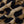 Luipaardprint stof close-up, bruine en zwarte vlekken, textielpatroon voor mode en interieur, trendy dierenprint design.