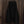 Zwarte wijde broek, hangend aan houten achtergrond, comfortabele pasvorm, casual stijl, ideaal voor dagelijks gebruik, modieuze dameskleding.