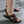 Bruine leren herensandalen met verstelbare riem, open teen en comfortabele zool, ideaal voor casual zomeroutfits en dagelijks gebruik.