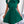 Groene geplooide jurk met strik, korte mouwen en elegante uitstraling. Perfect voor zomerse evenementen en modieuze dameskleding.
