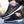 Donkerblauwe en bruine sportschoenen voor heren, comfortabele sneakers met witte zool, ideaal voor hardlopen en casual gebruik.