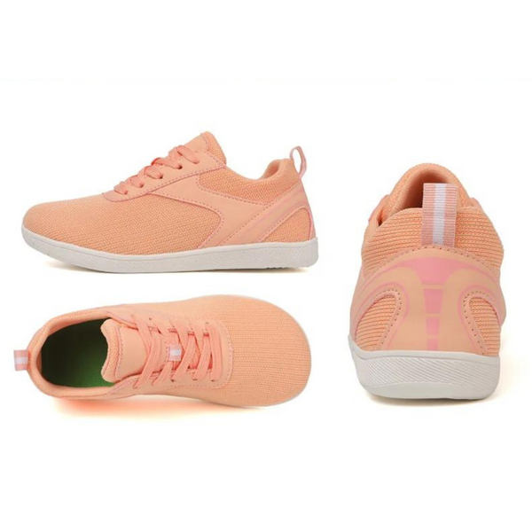 Perzikkleurige sneakers voor dames, lichtgewicht en ademend, met rubberen zool en vetersluiting. Ideaal voor casual en sportieve outfits.
