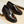 Donkerbruine leren loafers met dikke zolen en decoratieve gesp, stijlvolle herenschoenen, geschikt voor formele en casual gelegenheden.