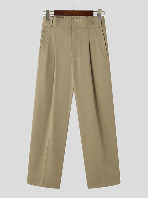 Beige damesbroek met wijde pijpen, hoge taille en plooidetails, ideaal voor casual en zakelijke outfits. Comfortabele en stijlvolle pasvorm.