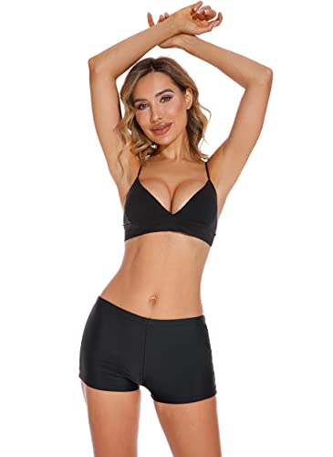 Zwarte dames sportbeha en shorts set, comfortabele fitnesskleding, ideaal voor yoga en workouts. Stijlvolle en functionele sportkleding.