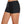 Zwarte dames zwemshorts, comfortabel en stijlvol, ideaal voor strand en zwembad. Hoogwaardige stof, perfecte pasvorm, sportieve look.