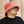 Man met roze teddy bucket hat en zonnebril, casual mode, buiten. Stijlvolle hoed, trendy accessoire, comfortabele kleding, moderne uitstraling.