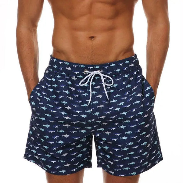 Donkerblauwe zwembroek met haaienprint, herenmode, strandkleding, zomerse stijl, comfortabele pasvorm, elastische tailleband, koordsluiting.