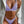 Vrouw in lila bikini en witte blazer, modieuze strandkleding, trendy zomeroutfit, stijlvolle badmode, elegante damesmode.