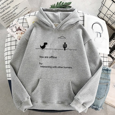 Grijze hoodie met dinosaurus en cactus print, tekst "You are offline". Casual mode, comfortabele kleding, unisex streetwear, trendy sweatshirt.