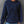 Vrouw in blauwe geribbelde hoodie met capuchon en zakken, casual mode, comfortabele dameskleding, herfst-winter outfit, trendy streetwear stijl.