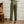 Groene linnen broek voor heren, achteraanzicht. Stijlvolle casual kleding, ideaal voor lente en zomer. Comfortabele pasvorm met opgerolde zoom.
