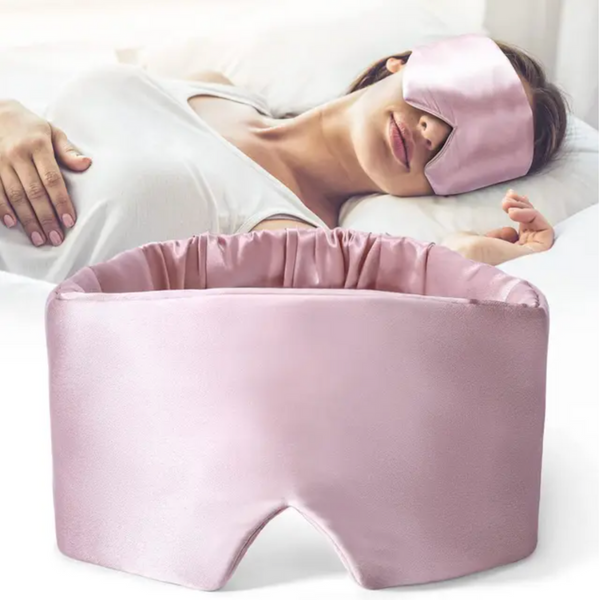 Zijde slaapmasker in roze, ideaal voor ontspanning en betere slaap. Comfortabel en zacht, perfect voor reizen en thuisgebruik.