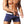 Man in blauwe zwembroek met witte tailleband, gespierd bovenlichaam, buiten in de zon. Sportieve zwemkleding, strandmode, zomerstijl.