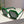 Groene zeshoekige zonnebril met donkere glazen op een grijze ondergrond, modieuze accessoire, trendy design, unisex zonnebril, UV-bescherming.