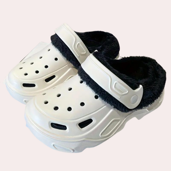Witte klompen met zwarte bontvoering, comfortabele uniseks schoenen, ideaal voor dagelijks gebruik. Trendy en praktisch schoeisel voor binnen en buiten.