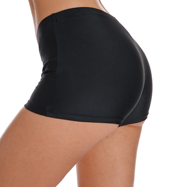 Zwarte dames sportshorts, strak en elastisch, ideaal voor fitness en yoga. Hoogwaardige stof, comfortabele pasvorm, perfect voor actieve dames.