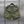 Olijfgroene cargoshorts met elastische tailleband en meerdere zakken, hangend aan een zwarte hanger. Ideaal voor casual en outdoor activiteiten.
