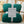 Groene fleece deken, geribbeld design, verpakt met wit label 