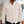 Beige heren vest, V-hals, knoopsluiting, gedragen over wit overhemd. Stijlvolle herenkleding, casual chic, mode voor mannen, herfstoutfit.