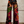 Damesbroek met kleurrijke, bohemien patchworkprint, wijde pijpen en hoge taille, perfect voor een trendy en unieke boho-stijl.