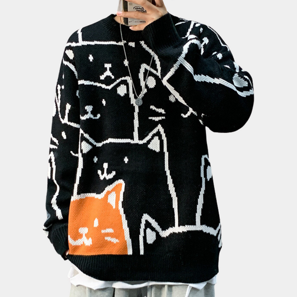 Zwarte trui met kattenprint, uniseks design, grafische katten in wit en oranje, casual streetwear, comfortabele pasvorm, trendy mode.