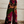 Gekleurde wijde broek met abstracte patronen, sterren en dierenprint, perfect voor bohemian mode en festivaloutfits. Trendy dameskleding.