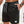 Man in zwarte sportshorts met witte trekkoord, hand in zak. Comfortabele herenkleding, casual zomeroutfit, fitnessmode.