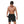 Man in zwarte sportshorts, toont rekbare stof. Fitnesskleding, ademend materiaal, geschikt voor training en casual dragen.