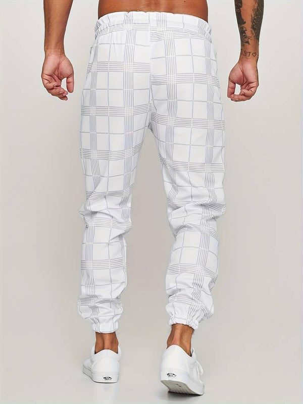 Witte geruite joggingbroek voor heren, achteraanzicht. Comfortabele pasvorm, elastische tailleband, trendy streetwear. Perfect voor casual outfits.