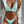 Vrouw in mintgroene bikini met witte blazer, modieuze strandkleding, zomertrends 2023, stijlvolle badmode, elegante damesmode.
