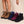 Vier paar winterlaarzen met veters en bontvoering in bruin, blauw, bordeaux en zwart, gedragen door model. Ideaal voor damesmode en winterkleding.