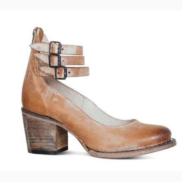 Bruine leren dameshak met dubbele gespsluiting en blokhak, vintage stijl. Perfect voor casual en formele gelegenheden. Comfortabele pasvorm.