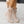 Beige suède dameslaarzen met lage hak en gespen, stijlvolle herfstmode, comfortabele en trendy schoenen voor dagelijks gebruik.
