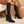 Zwarte gebreide kniehoge laarzen met hoge hakken, stijlvolle damesmode, perfect voor herfst- en winteroutfits, elegant en trendy design.