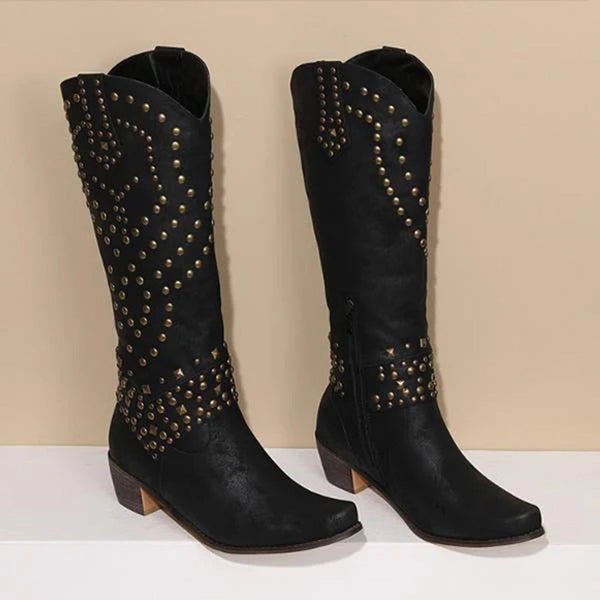 Zwarte leren laarzen met studs, westerse stijl, lage hak, damesmode, trendy schoenen, cowboylaarzen, herfst/winter 2023.