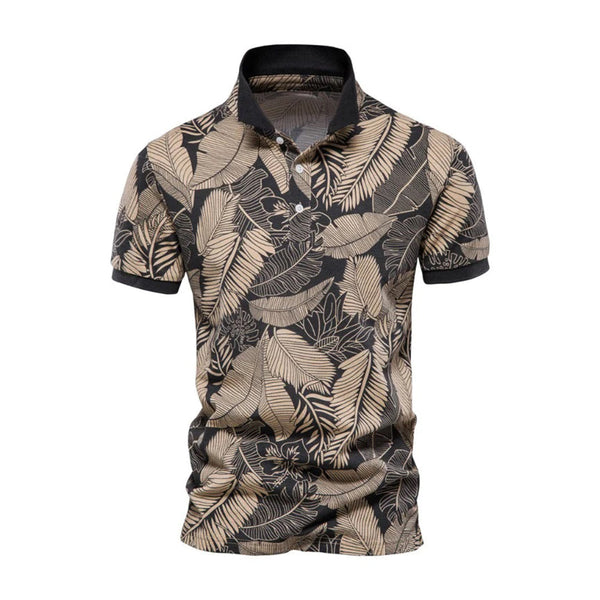 Zwarte herenpolo met beige tropische bladerenprint, korte mouwen en kraag. Perfect voor casual zomeroutfits. Hoogwaardige katoenen stof.