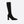 Zwarte gebreide kniehoge laars met hoge hak, elegant en stijlvol, perfect voor damesmode. Ideaal voor herfst- en winteroutfits.