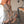 Bruine leren cowboylaarzen met studs, damesmode, westerse stijl, houten vloer, trendy laarzen, herfstmode, bohemian look, comfortabele hakken.